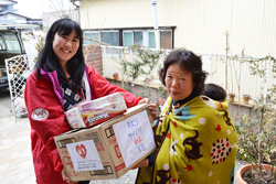 AAR staff delivering diapers and other relief items to a church preschool in Ishinomaki.