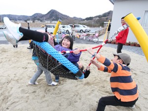 Children enjoy an AAR swing